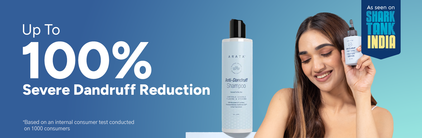 Woman holding a bottle of shampoo with text about dandruff reduction on a blue background