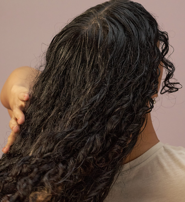You always need a leave-in underneath curl cream